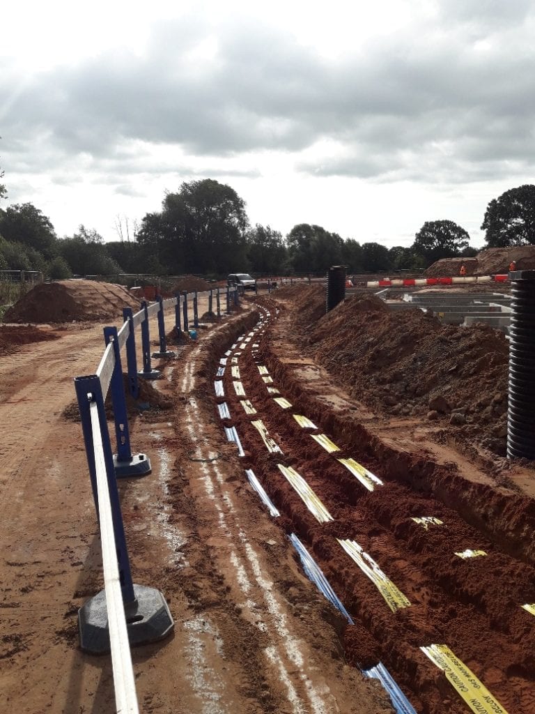Utility connections laid in a trench