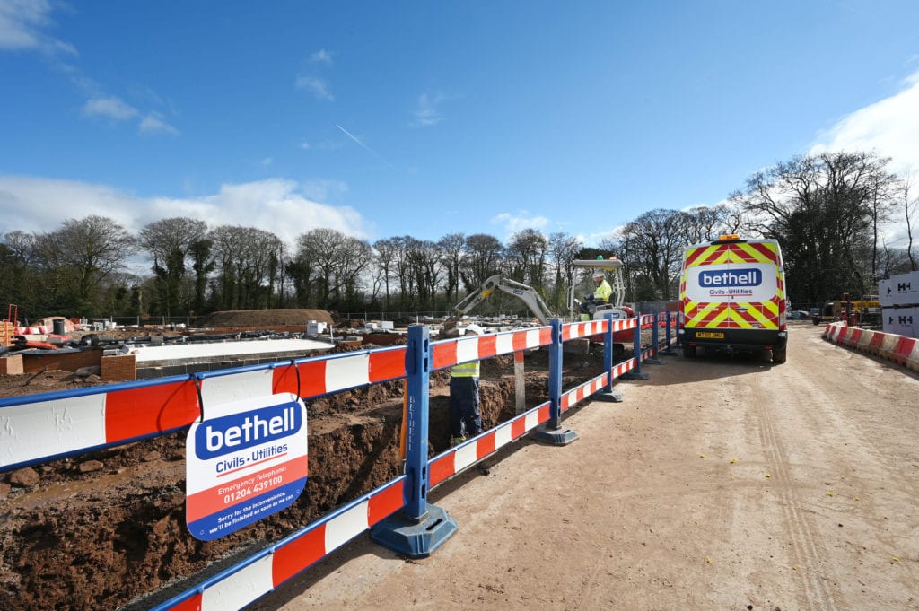 Utility operatives at a housing development site