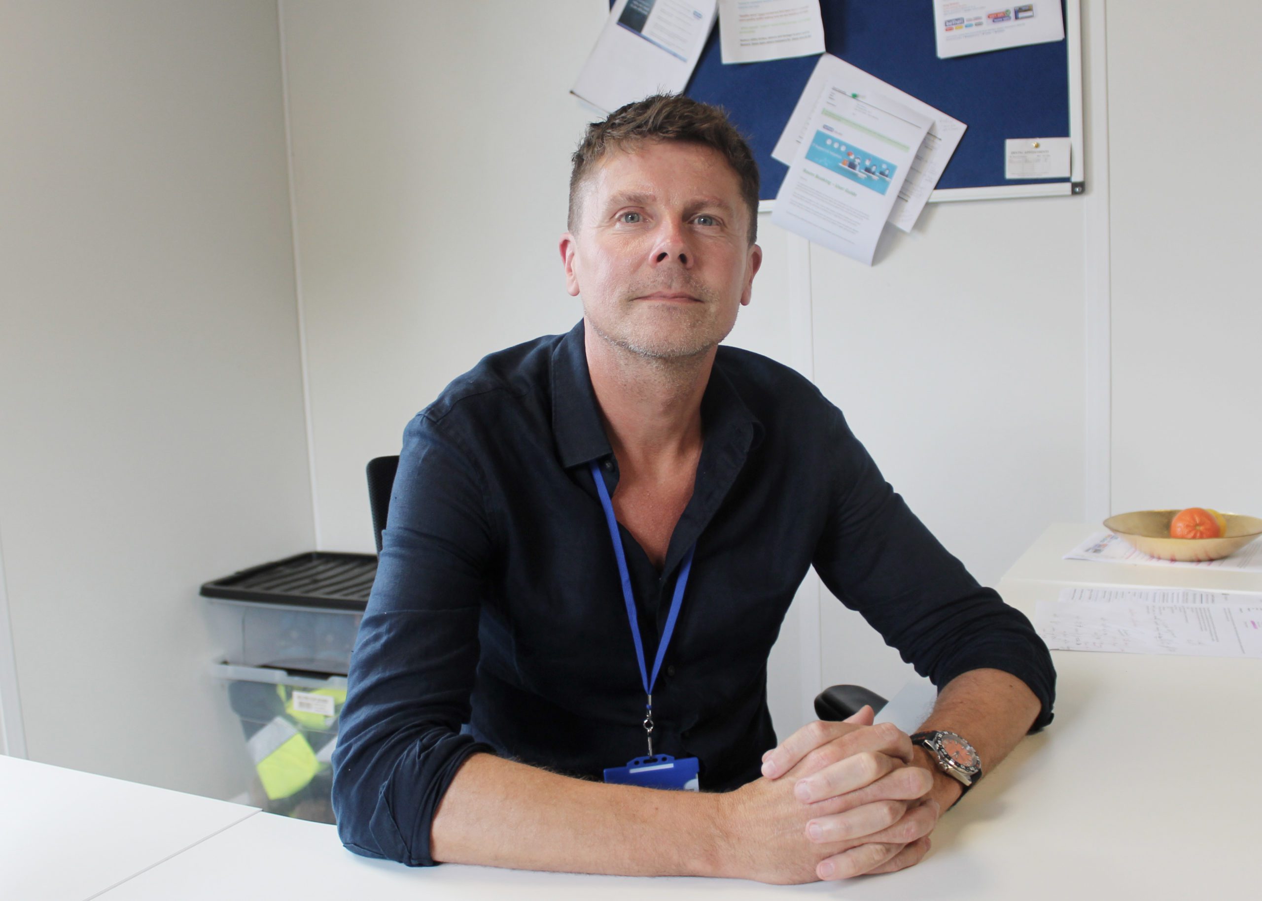 Bethell Utility Services Managing Director at desk