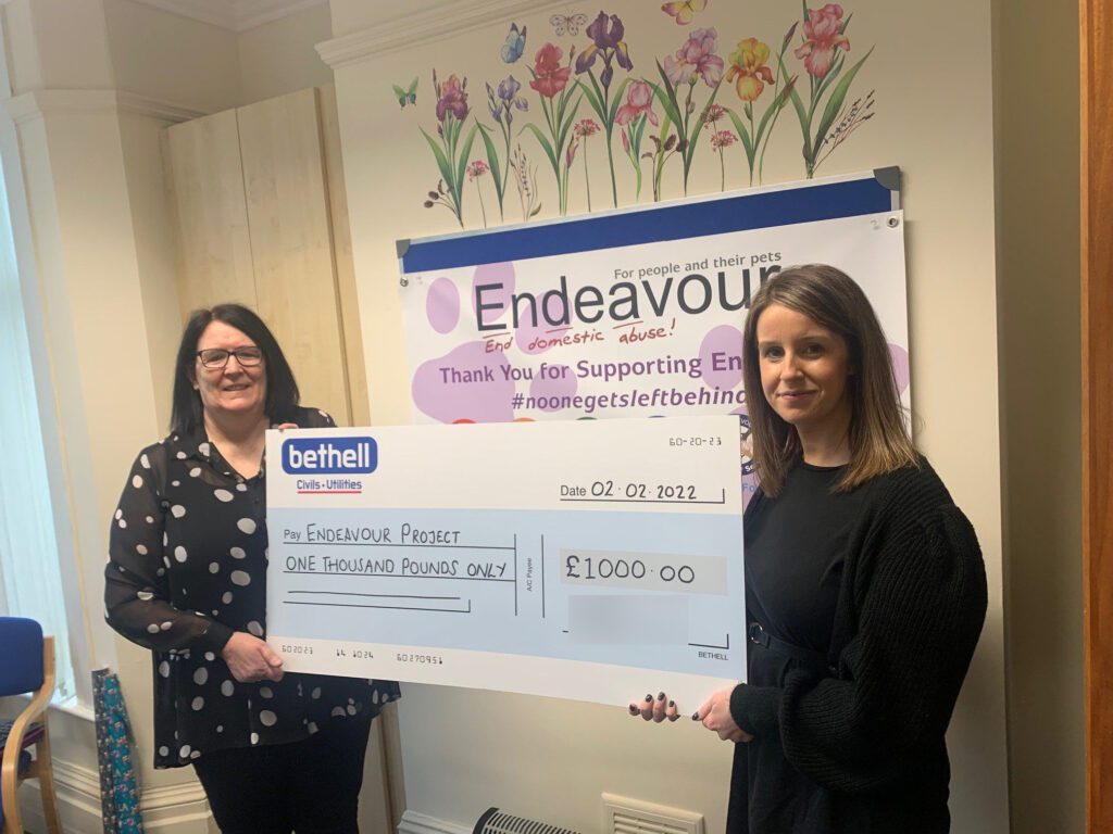 Cheque presentation for domestic abuse charity
