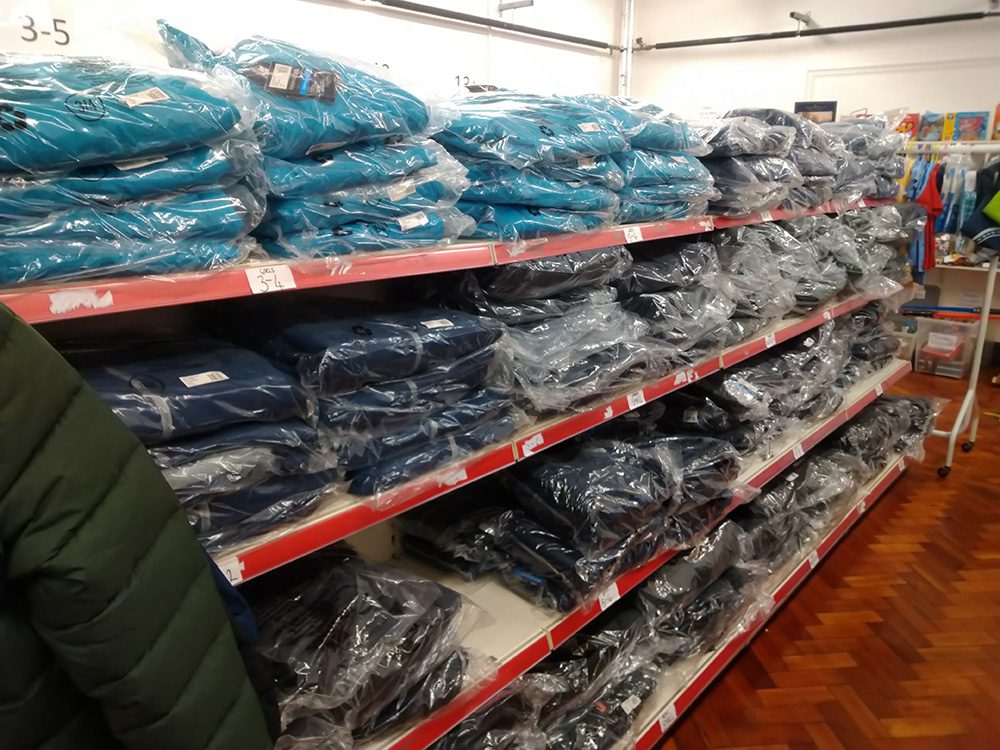 Collection of donated coats for winter charity appeal