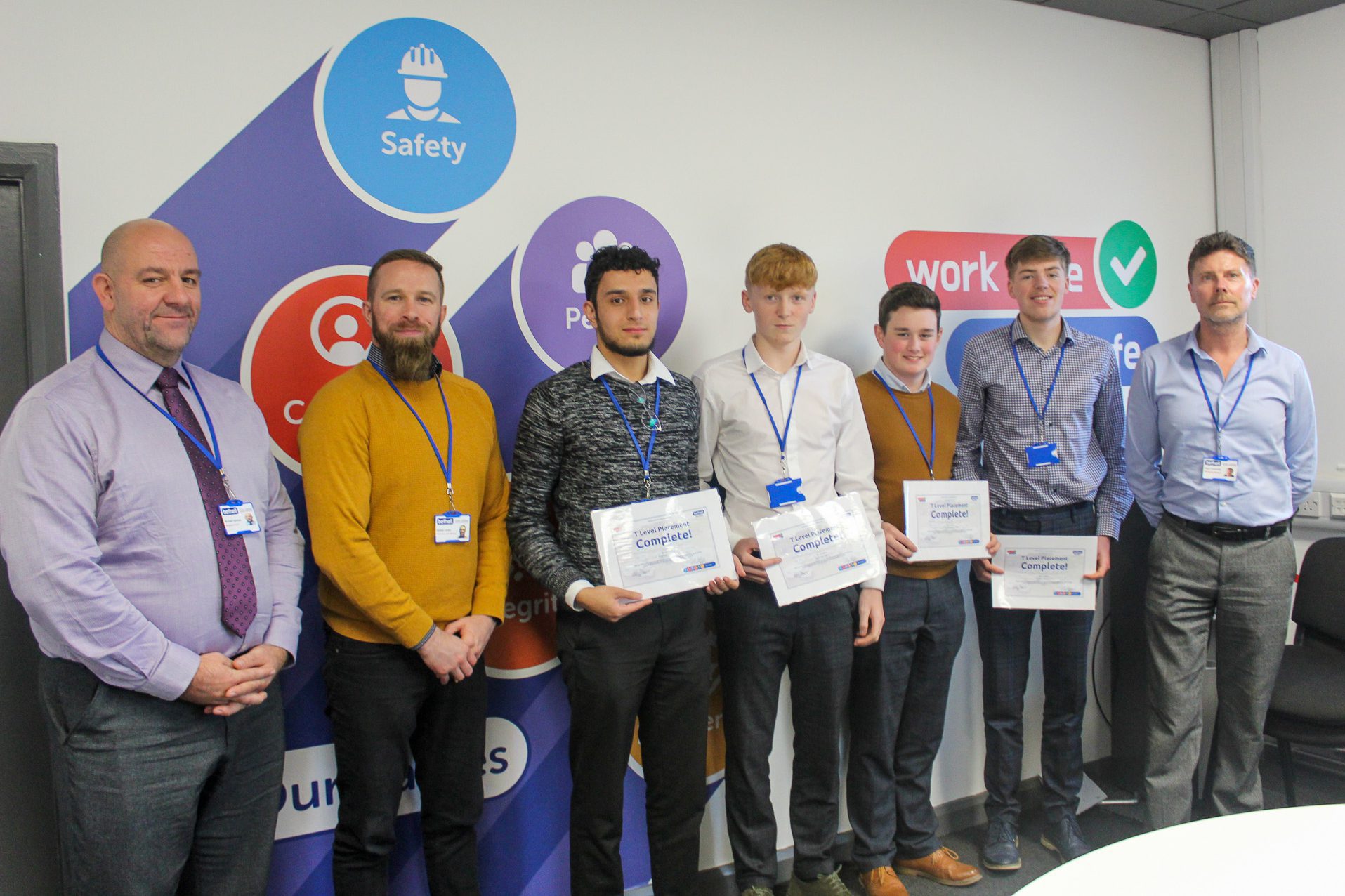 Group of T Level work experience placement students being awarded with completion certificates