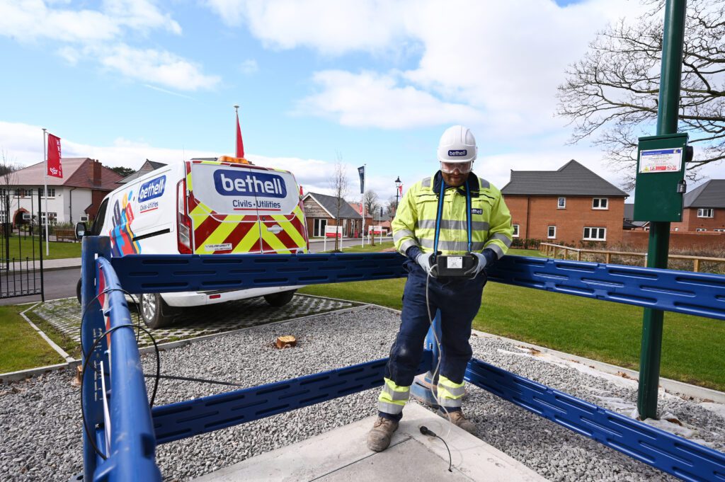 Utility operative conducting a gas mains test